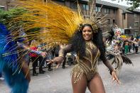 <p>The grand finale of the Notting Hill Carnival, during which performers present their costumes and dance to the rhythms of the mobile sound systems or steel bands along the streets of West London. Hundreds of thousands revellers are expected to take part in Notting Hill Carnival. (Photo: Wiktor Szymanowicz / Barcroft Media via Getty Images) </p>