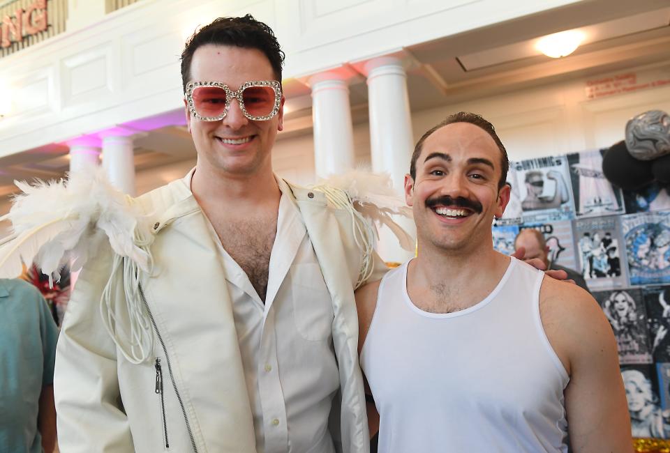 Silas Crisp dressed as Elton John, left, and Clint Walker as Freddie Mercury of Queen, attended the 10th annual Spartanburg Little Theatre season reveal gala Thursday night at the Chapman Cultural Center. Guests dressed up as icons of entertainment as part of the celebration.