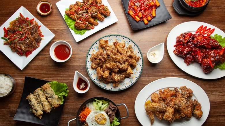 Various Asian dishes on table