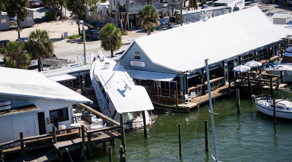 A boat that broke loose from the docks at Bonita BillÕs  on Fort Myers Beach got lodged on the dock during Hurricane Ian. Almost 8 months later the boat has yet to be removed. It has become quite the attraction for patrons of Bonita Bills. It is unknown when the boat will be removed but the owners of the popular restaurant are hoping sooner than later. 