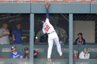 A triple by St. Louis Cardinals' Tommy Edman gets past Atlanta Braves' Nick Markakis during the second inning of Game 5 of their National League Division Series baseball game, Wednesday, Oct. 9, 2019, in Atlanta. (AP Photo/John Bazemore)