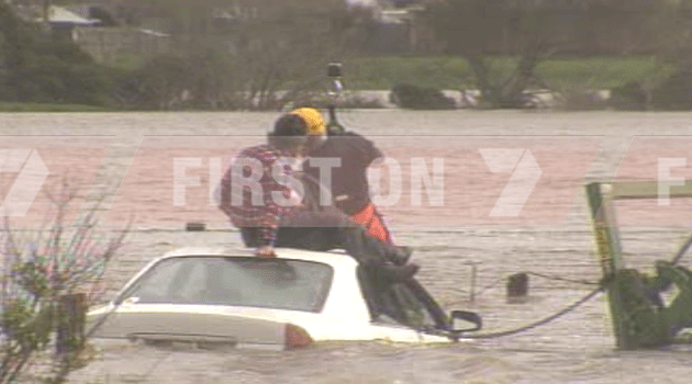 Exclusive: Man winched to safety after becoming stuck in flood waters at Buffalo. Photo: 7News