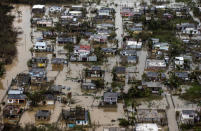 <p>Aerial photo of the floadings in the costal town of Loiza, in the north shore of Puerto Rico on sept. 22, 2017. (Photo: Dennis M. Rivera Pichardo for The Washington Post via Getty Images) </p>