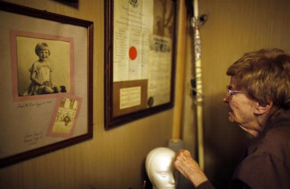 June Manning, 84, looks at a photo of herself aged four in her trailer home in which she has lived for 18 years, in Village Trailer Park in Santa Monica, July 12, 2012. Developer Marc Luzzatto wants to relocate residents from the trailer park to make way for nearly 500 residences, office space, stores, cafes and yoga studios, close to where a light rail line is being built to connect downtown Los Angeles to the ocean.