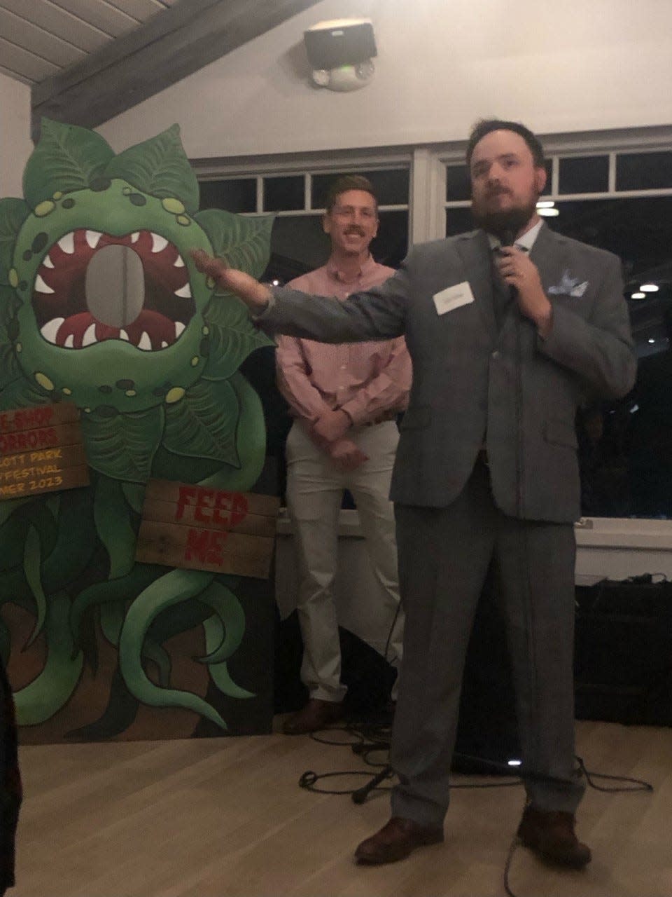 Tom Alsip, who will direct the Prescott Park Arts Festival's summer musical, speaks at a party at The View at Pepperrell Cove in Kittery Point Thursday where the festival unveiled it will present "Little Shop of Horrors" next summer.