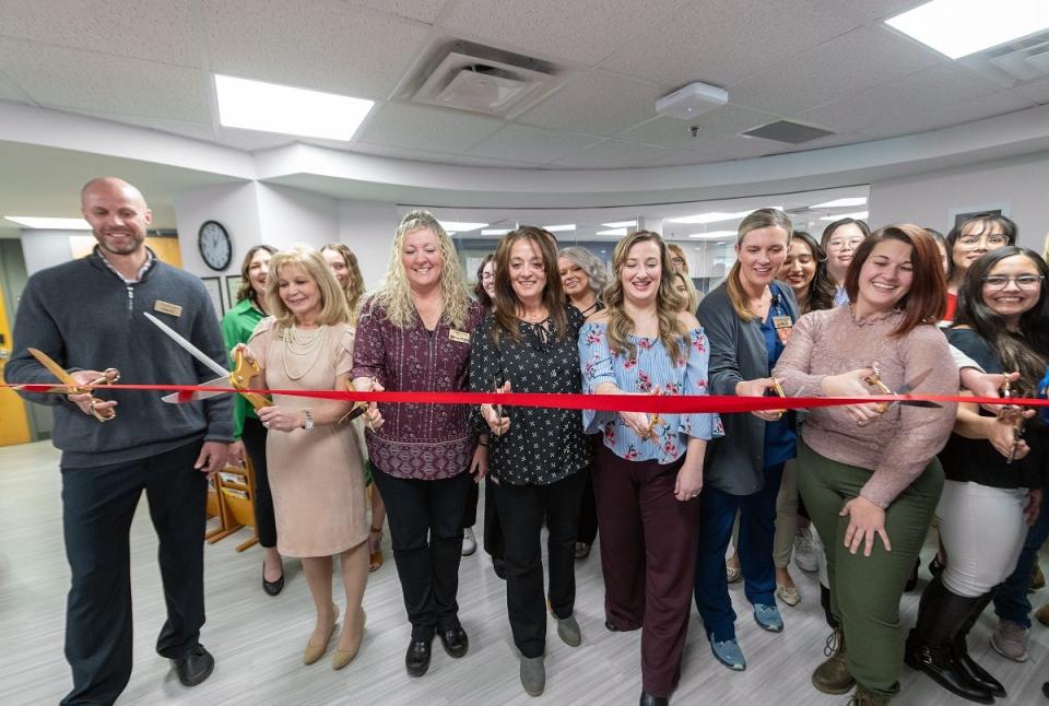 PCC President Patty Erjavec, dental hygiene program staff and students cut the ribbon for the newly renovated Health Science building on March 1, 2024