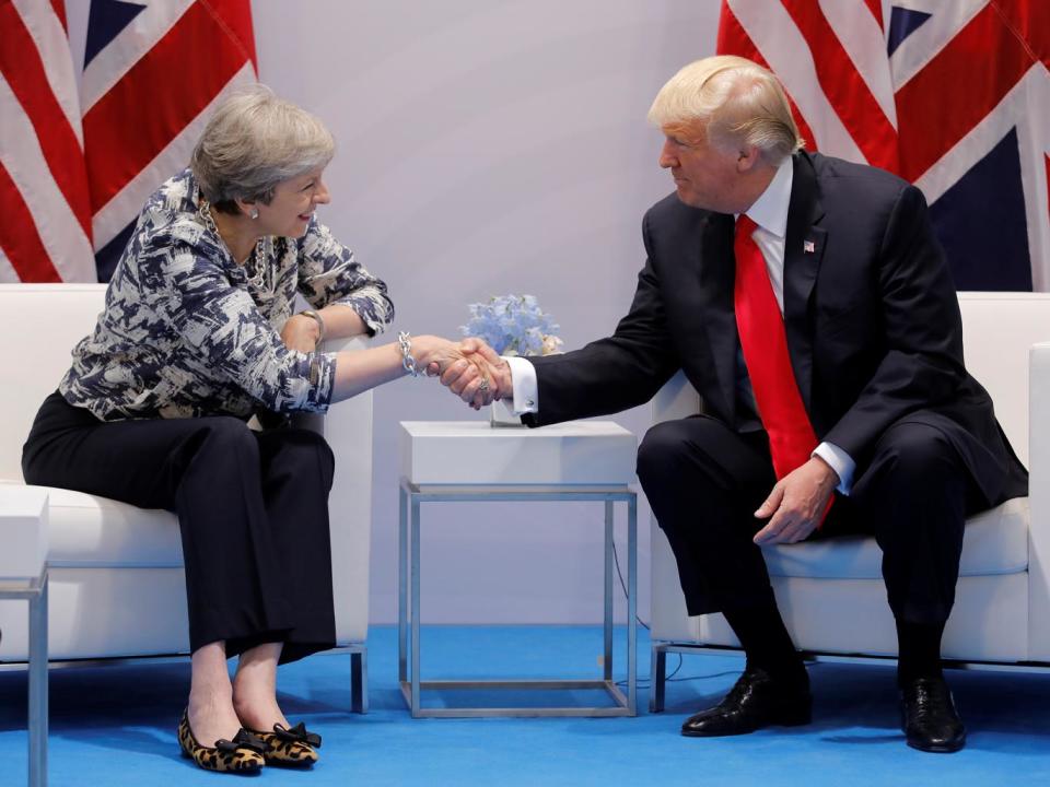 Theresa May talks with Donald Trump during the G20 leaders' summit in Hamburg (REUTERS)