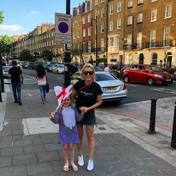 <p>Daughter Pixie looked cute as a button as she threw support behind the UK during their World Cup attempt. Source: Instagram/RoxyJacenko </p>