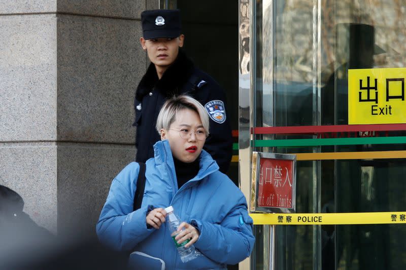 Teresa Xu leaves the Chaoyang People's Court after a court hearing in Beijing