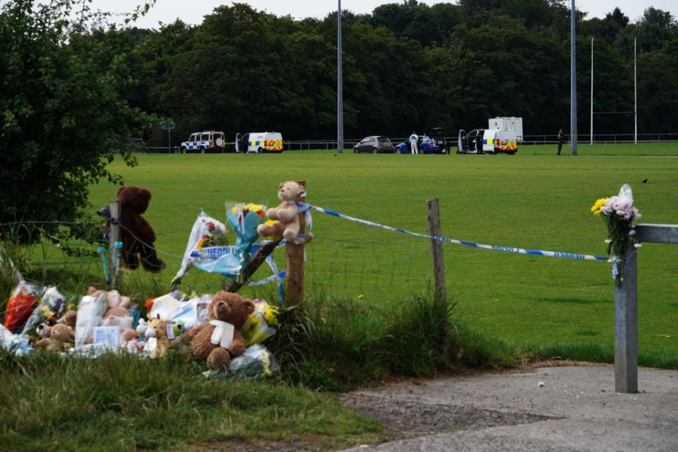 Tributes left at the scene in the Sarn area of Bridgend, south Wales, near to where five-year-old Logan Mwangi was found dead(Ben Birchall/PA) (PA Wire)