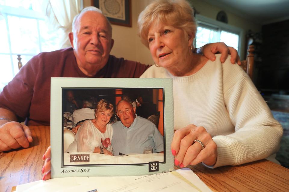 Bertram "Buzz" and Carol Palk of Whipanny talk about their difficult experiences after they were removed from a cruise ship in Mexico due to a problem with Carol's health. They are at their kitchen table on January 25, 2019 with a photo that was taken on the cruise ship before they were let go in Mexico.