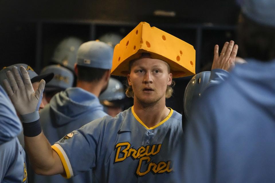 Milwaukee Brewers' Joey Wiemer is congratulated after hitting a home run during the sixth inning of a baseball game against the Pittsburgh Pirates Friday, June 16, 2023, in Milwaukee. (AP Photo/Morry Gash)