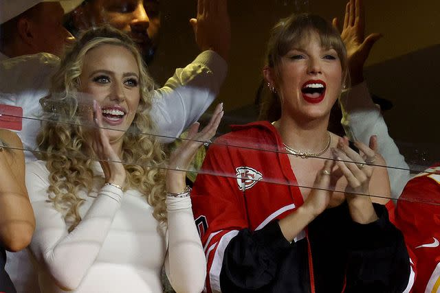 <p>Jamie Squire/Getty Images</p> Brittany Mahomes and Taylor Swift celebrate a touchdown by the Kansas City Chiefs against the Denver Broncos