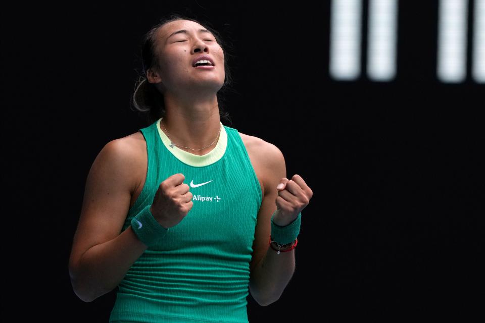 Zheng Qinwen celebrates beating Wang Yafan (Andy Wong/AP) (AP)