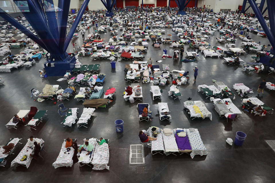 People take shelter at the George R. Brown Convention Center in Houston.&nbsp;