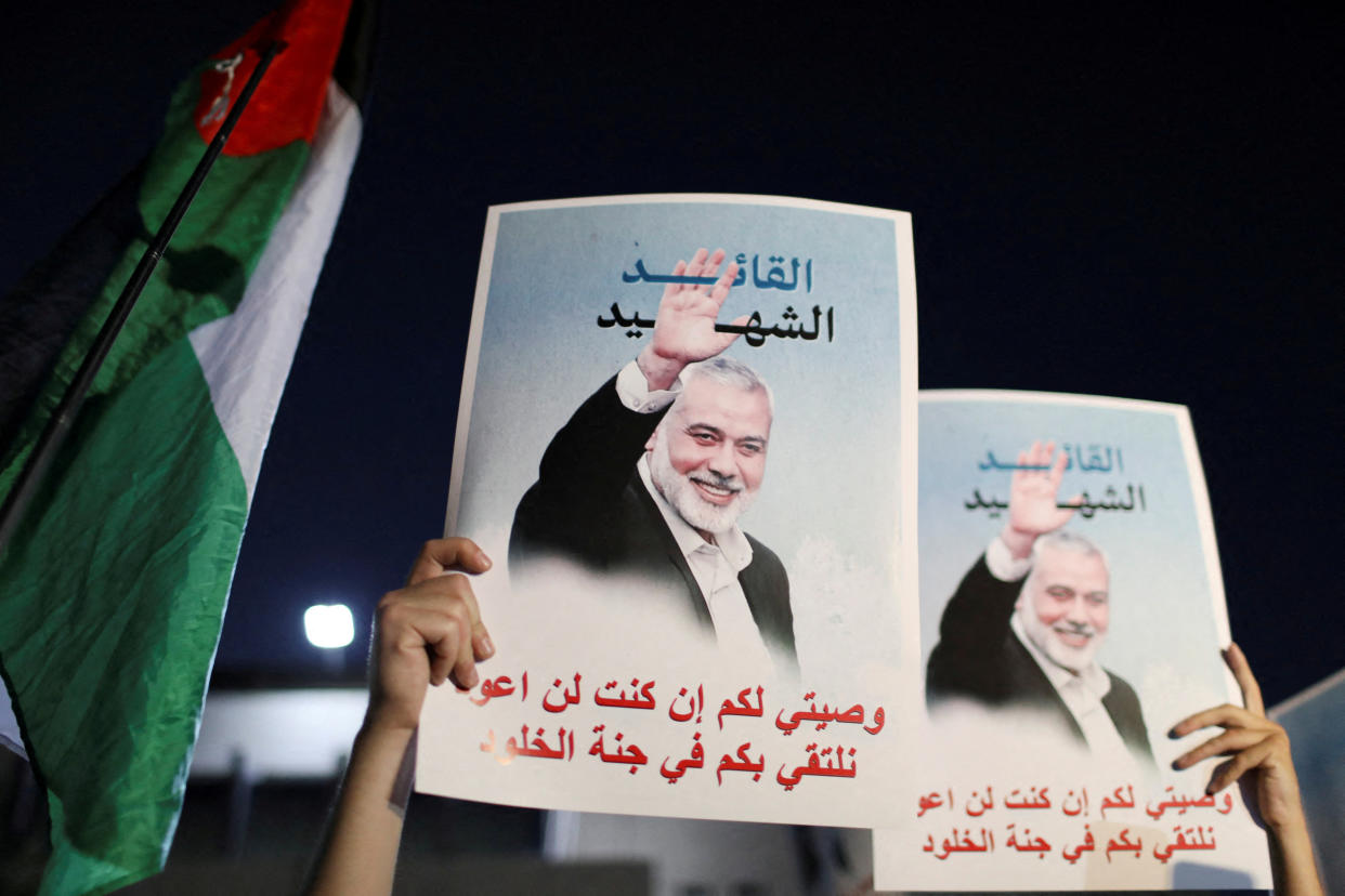 People protest following the assassination of Hamas leader Ismail Haniyeh in Iran, near the Israeli Embassy in Amman, Jordan, on Wednesday. 