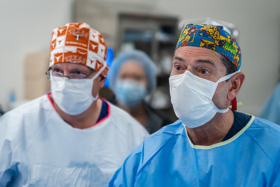 Dr. Kenneth Moise Jr., left, and Dr. Michael Bebbington head the Comprehensive Fetal Care Center at Dell Children's Medical Center of Central Texas. Together they watch the screen to see how Jeannette Becerra's babies are positioned during the first fetal surgery at the hospital.