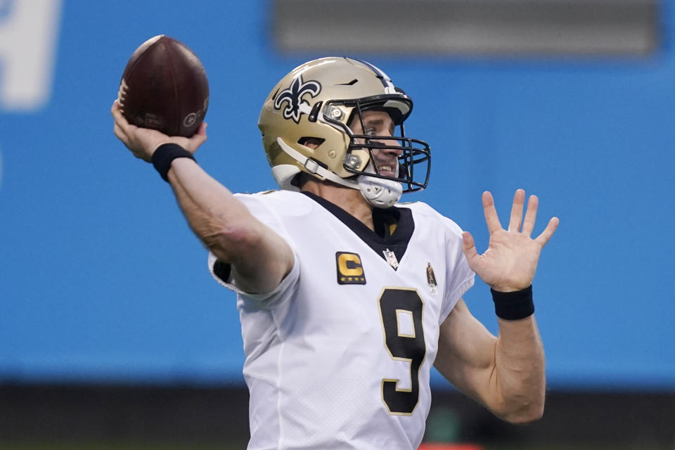 New Orleans Saints quarterback Drew Brees passes against the Carolina Panthers during the first half of an NFL football game Sunday, Jan. 3, 2021, in Charlotte, N.C. (AP Photo/Gerry Broome)