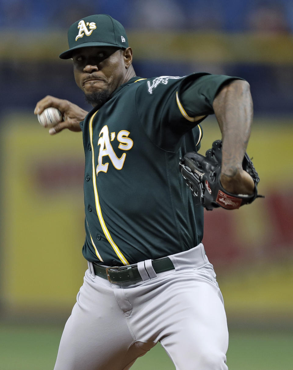 Oakland Athletics' Edwin Jackson goes into his wind up against the Tampa Bay Rays during the first inning of a baseball game Friday, Sept. 14, 2018, in St. Petersburg, Fla. (AP Photo/Chris O'Meara)
