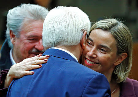 Luxembourg's Foreign Minister Jean Asselborn (L), Germany's Foreign Minister Frank-Walter Steinmeier, and European Union foreign policy chief Federica Mogherini (R) attend a European Union foreign ministers meeting in Brussels, Belgium November 14, 2016. REUTERS/Yves Herman