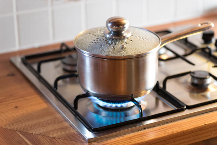 A pot on a gas stove. (Getty Images)