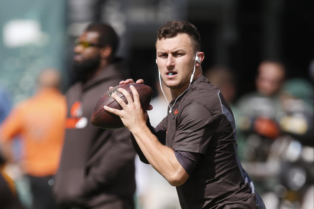 Cleveland Browns quarterback Johnny Manziel throws a pass before an NFL football game against the New York Jets Sunday, Sept. 13, 2015 in East Rutherford, N.J. (AP Photo/Kathy Willens)