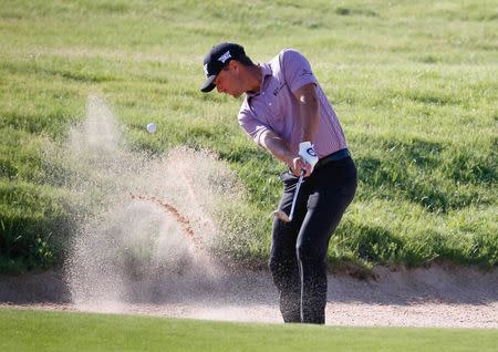 FILE PHOTO: May 17, 2018; Dallas, TX, USA; Charles Howell III plays a shot from the a green side bunker on the on the fifth hole during the first round of the AT&T Byron Nelson golf tournament at Trinity Forest Golf Club. Mandatory Credit: Ray Carlin-USA TODAY Sports