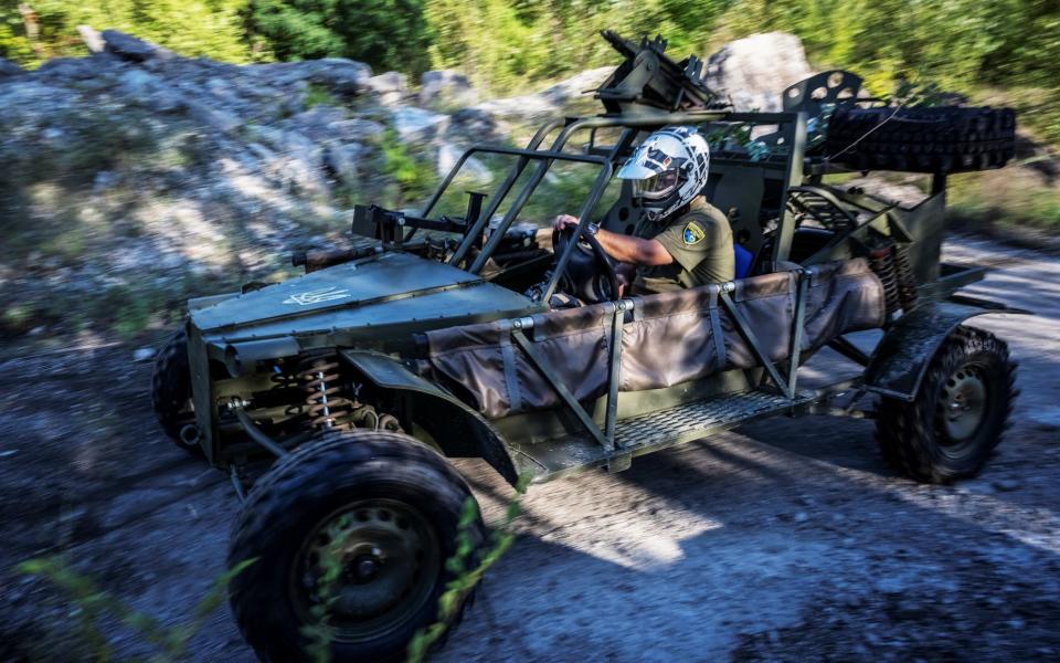 A Ukrainian engineer tests a Fast Attack Vehicle, to be used for reconnaissance, rescue, special operations and delivery of ammunition