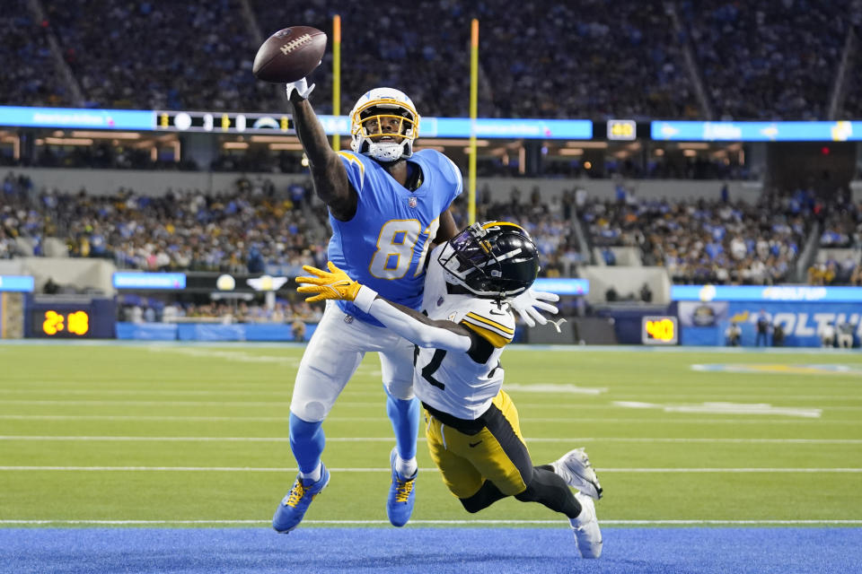 Los Angeles Chargers wide receiver Mike Williams, left, can't make the catch in the end zone as Pittsburgh Steelers cornerback James Pierre defends during the first half of an NFL football game Sunday, Nov. 21, 2021, in Inglewood, Calif. Pierre picked up a pass interference call on the play. (AP Photo/Marcio Jose Sanchez)