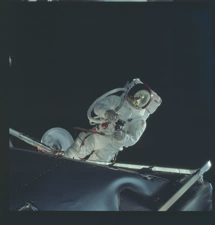 Astronaut Russell L. Schweickart, lunar module pilot, operates a 70mm Hasselblad camera during his extravehicular activity (EVA) on the fourth day of the Apollo 9 Earth-orbital mission March 6, 1969. REUTERS/NASA/Handout