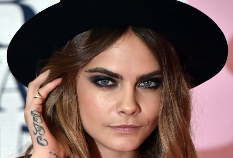 Cara Delevingne is a fan of big, natural brows. Source: Getty