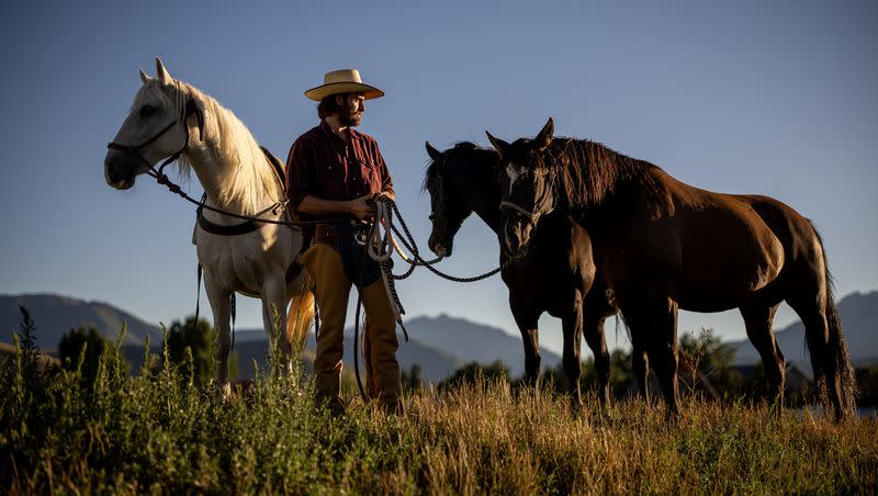 Jake Harvath poses for a photo with his three horses, Bella, Denver and Eddy, left to right, at Sage Creek Equestrian in Charleston, Wasatch County, on Tuesday, Sept. 5, 2023, as he prepares to embark on a yearlong cross-country horse ride.