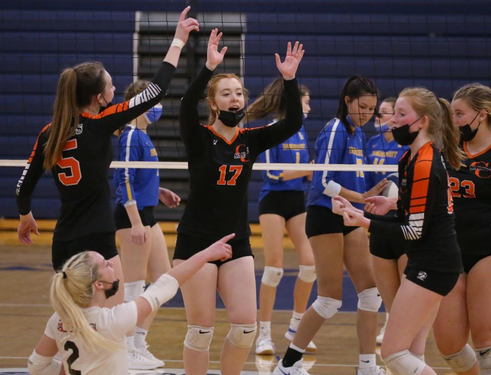Churchville-Chili celebrate a point late in the third set during their Section V Class A championship finals match up Saturday, Nov. 6, 2021 at Gates Chili High School.   Churchville-Chili won the championship in straight sets 25-9, 25-15, 25-21. 