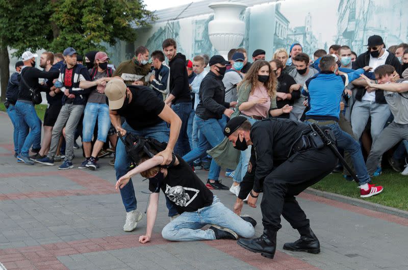 Law enforcement officers detain participants of a protest after the Belarusian election commission refused to register Viktor Babariko and Valery Tsepkalo as candidates for the upcoming presidential election in Minsk