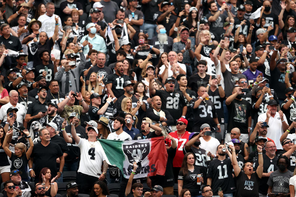 LAS VEGAS, NEVADA - SEPTEMBER 13: Las Vegas Raiders fans cheer during the game between the Raiders and the Baltimore Ravens at Allegiant Stadium on September 13, 2021 in Las Vegas, Nevada. (Photo by Christian Petersen/Getty Images)