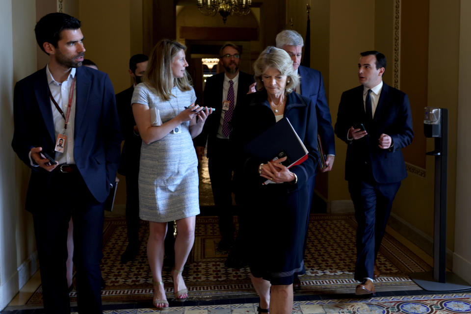 WASHINGTON, DC - JUNE 09: Sen. Lisa Murkowski (R-AK) (L) and Sen. Bill Cassidy (R-LA) (2nd R) leave the office of Senate Minority Leader Mitch McConnell (R-KY) following a meeting on Capitol Hill on June 09, 2021 in Washington, DC. Since the talks on infrastructure legislation with the White House fell through, a bipartisan group of senators have organized to try drafting a proposal themselves. (Photo by Anna Moneymaker/Getty Images)