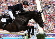 LONDON, ENGLAND - AUGUST 06: Ben Maher of Great Britain riding Tripple X competes in the 3rd Qualifier of Individual Jumping on Day 10 of the London 2012 Olympic Games at Greenwich Park on August 6, 2012 in London, England. (Photo by Mike Hewitt/Getty Images)