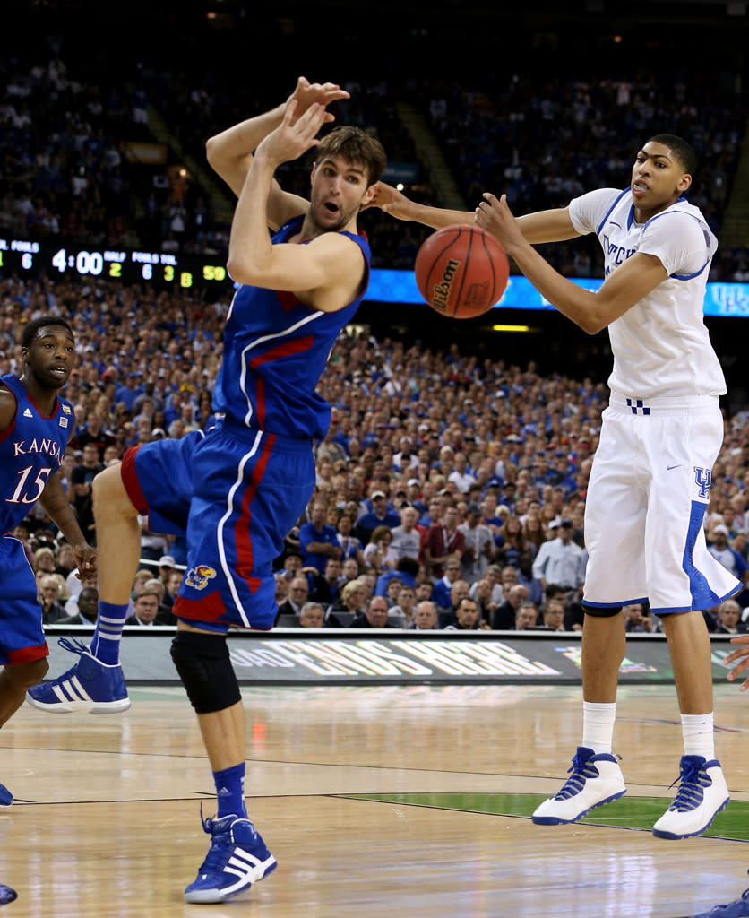 Jeff Withey #5 of the Kansas Jayhawks is unable to catch the ball in front of Anthony Davis #23 of the Kentucky Wildcats in the second half in the National Championship Game of the 2012 NCAA Division I Men's Basketball Tournament at the Mercedes-Benz Superdome on April 2, 2012 in New Orleans, Louisiana. (Photo by Jeff Gross/Getty Images)