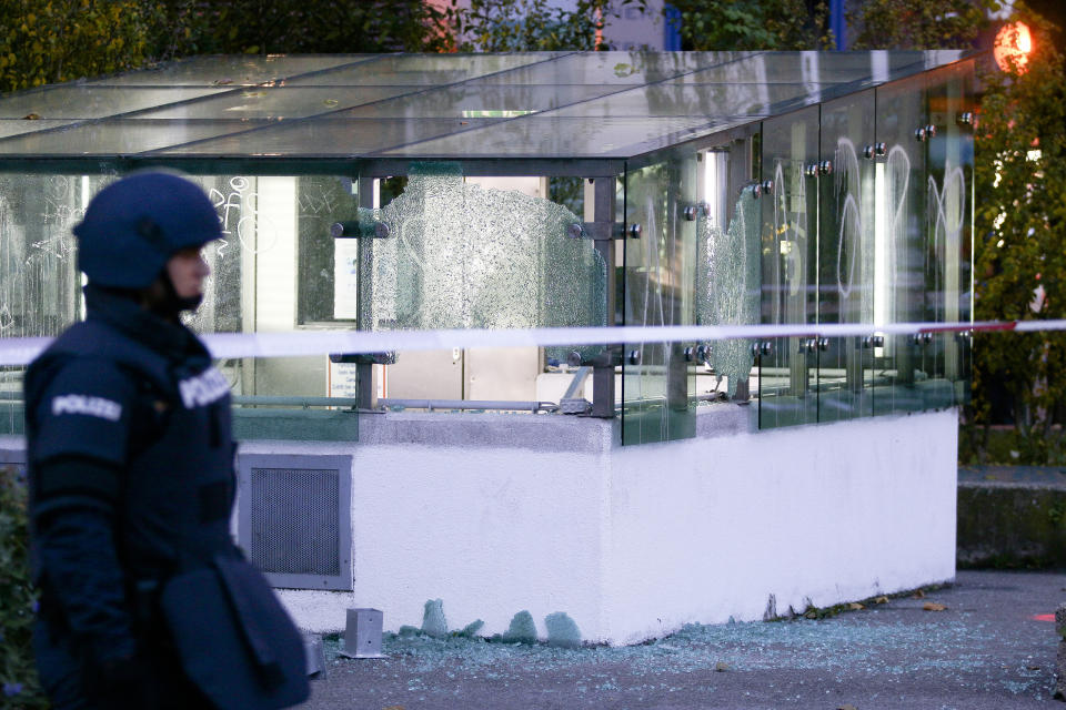 A police officer patrols in front of an entrance of a car parking with broken glasses after a shooting, in Vienna, Austria, Tuesday, Nov. 3, 2020. Police in the Austrian capital said several shots were fired shortly after 8 p.m. local time on Monday, Nov. 2, in a lively street in the city center of Vienna. Austria's top security official said authorities believe there were several gunmen involved and that a police operation was still ongoing. (Photo/Ronald Zak)