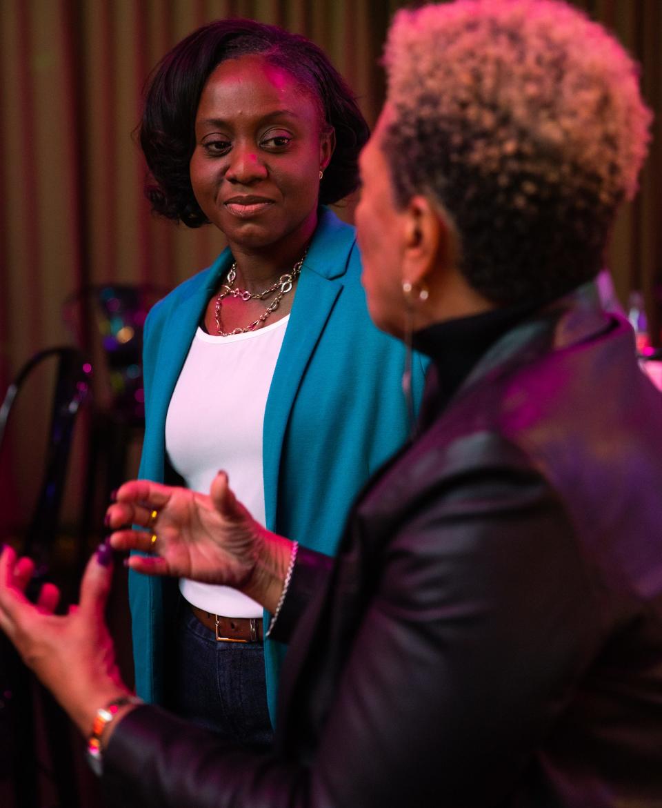 Kesha Hodge Washington (left) speaks to Ann Hart (right) at The Duce in Phoenix on Jan. 26, 2023.