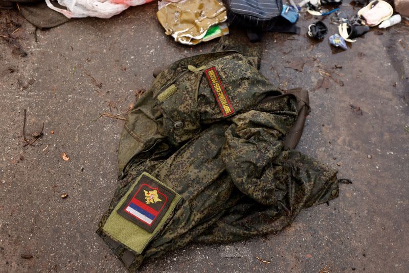 FILE PHOTO: A Russian military uniform is seen on the ground, in Dmytrivka village