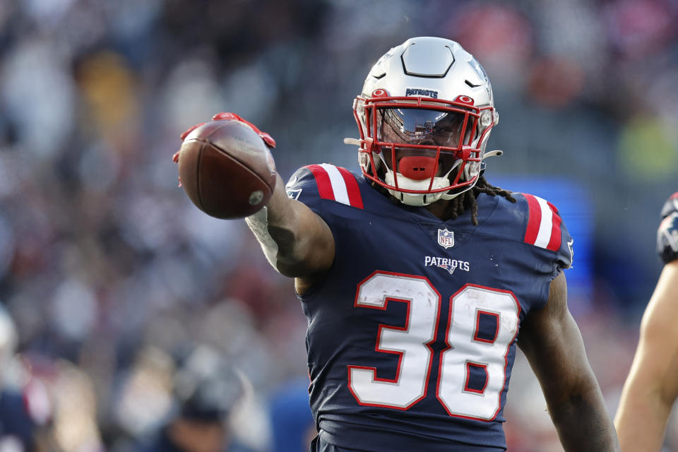 Rhamondre Stevenson, 38, of the New England Patriots runs back during the first half of an NFL football game in Foxborough, Massachusetts on Sunday, Nov. 20, 2022. (AP Photo/Michael Dwyer)