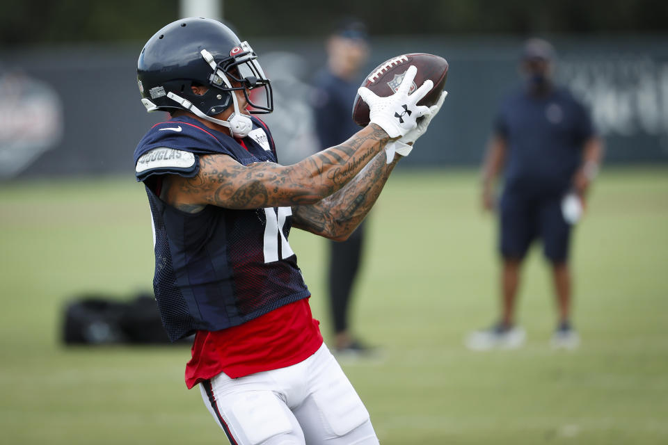 Houston Texans wide receiver Kenny Stills (12) hauls in a reception during an NFL training camp football practice Monday, Aug. 24, 2020, in Houston. (Brett Coomer/Houston Chronicle via AP, Pool)
