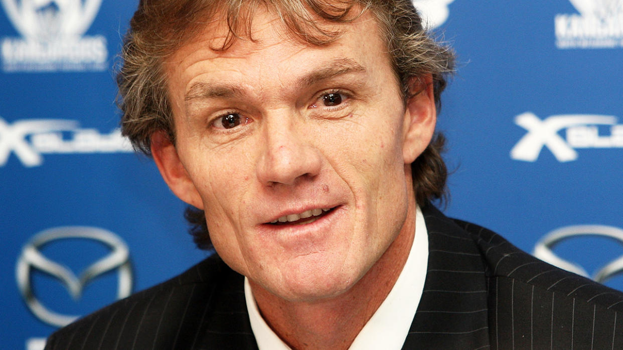Dean Laidley, pictured here speaking to the media at North Melbourne in 2009.