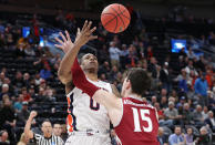 <p>Horace Spencer #0 of the Auburn Tigers battles for the ball with Ivan Aurrecoechea #15 of the New Mexico State Aggies during the first half in the first round of the 2019 NCAA Men’s Basketball Tournament at Vivint Smart Home Arena on March 21, 2019 in Salt Lake City, Utah. (Photo by Patrick Smith/Getty Images) </p>