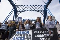 <p>(From left to right) Student organizers Ellie Lancaster, Emily Masternak, Sara Ojala, Mya Gregory and Evan Calderon lead the way over the Blue Bridge during the March for Our Lives 2018 event in Grand Rapids, Michigan. (Casey Sykes/MLive.com/AP) </p>