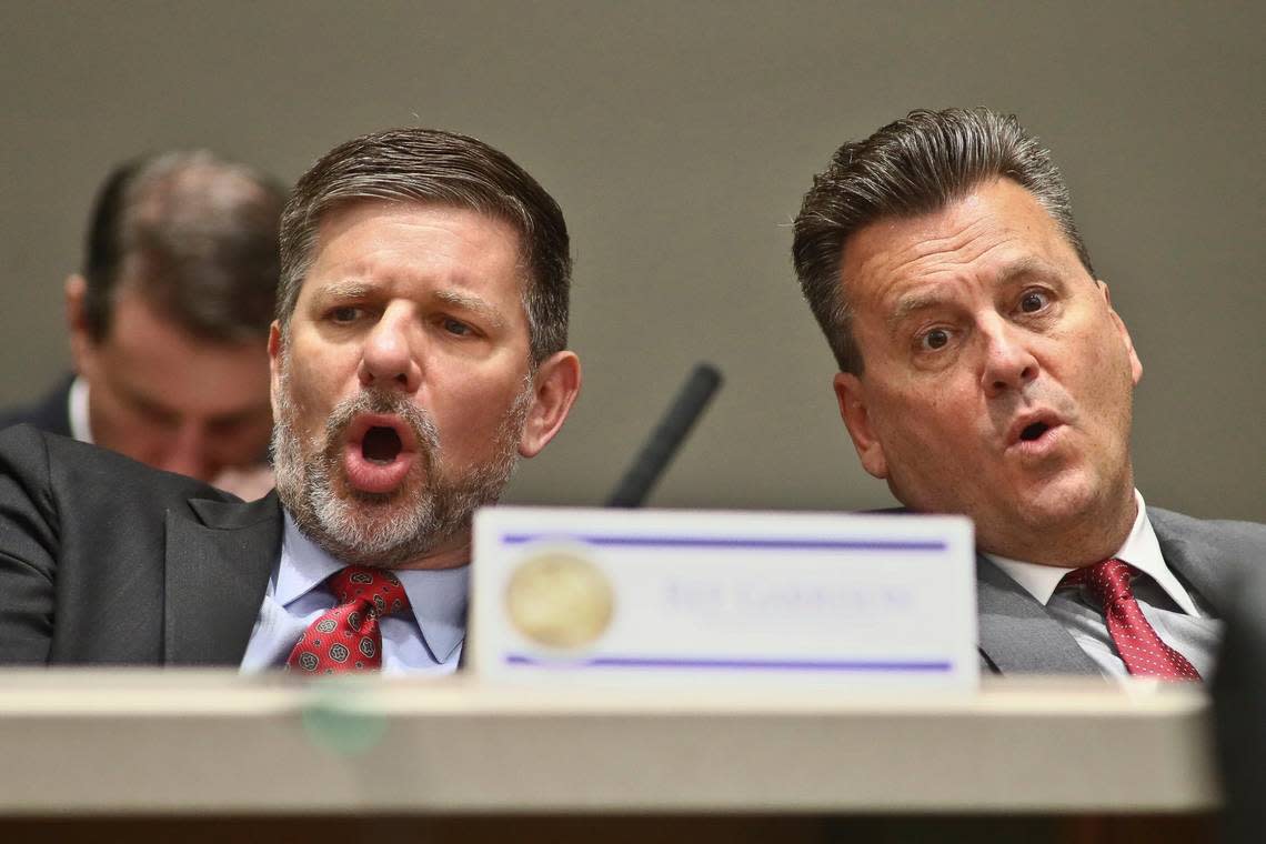 Rep. Sam Garrison, R-Fleming Island, and Rep. Fred Hawkins, R-St. Cloud, voice a “No” vote to an amendment on a bill about migrant transportation during an Appropriations Committee meeting, Monday, Feb. 6, 2023, in the Knott Building at the Capitol in Tallahassee, Fla.