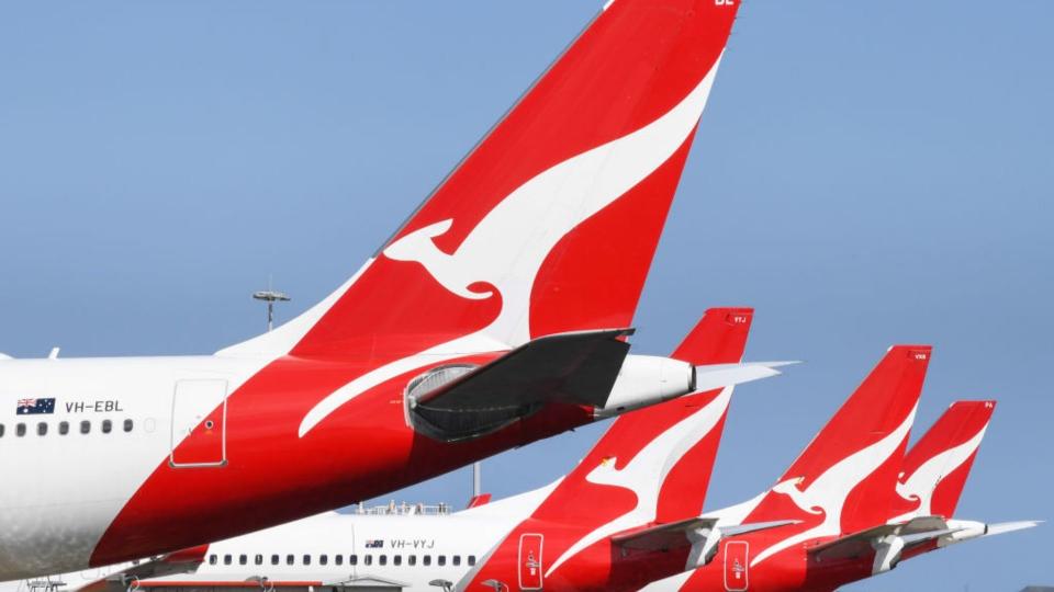 Four Qantas airplanes. 