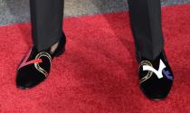 <p>Kentucky’s De’Aaron Fox shows off his shoes as he stops for photos while walking the red carpet before the start of the NBA basketball draft, Thursday, June 22, 2017, in New York. (AP Photo/Frank Franklin II) </p>