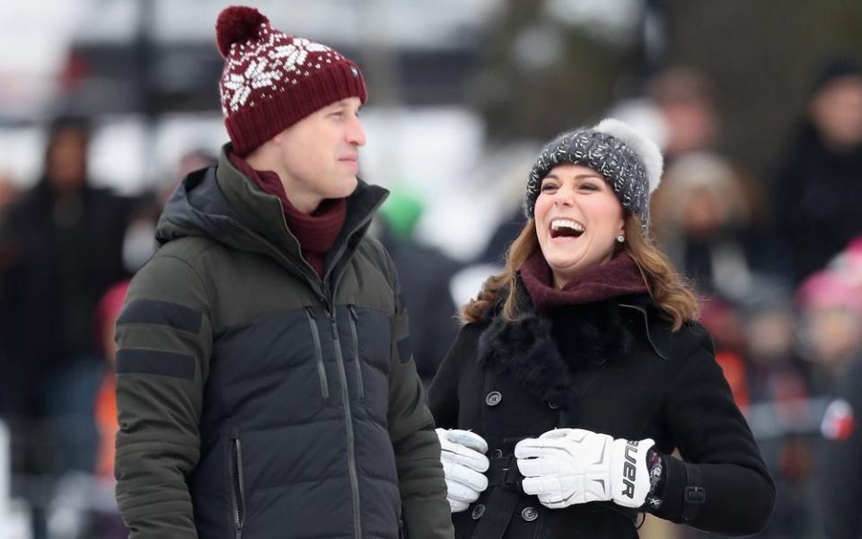 Prince William, Duke of Cambridge and Catherine, Duchess of Cambridge laugh as they attend a Bandy hockey match where they will learn more about the popularity of the sport during day one of their Royal visit to Sweden and Norway on January 30, 2018 in Stockholm, Sweden.